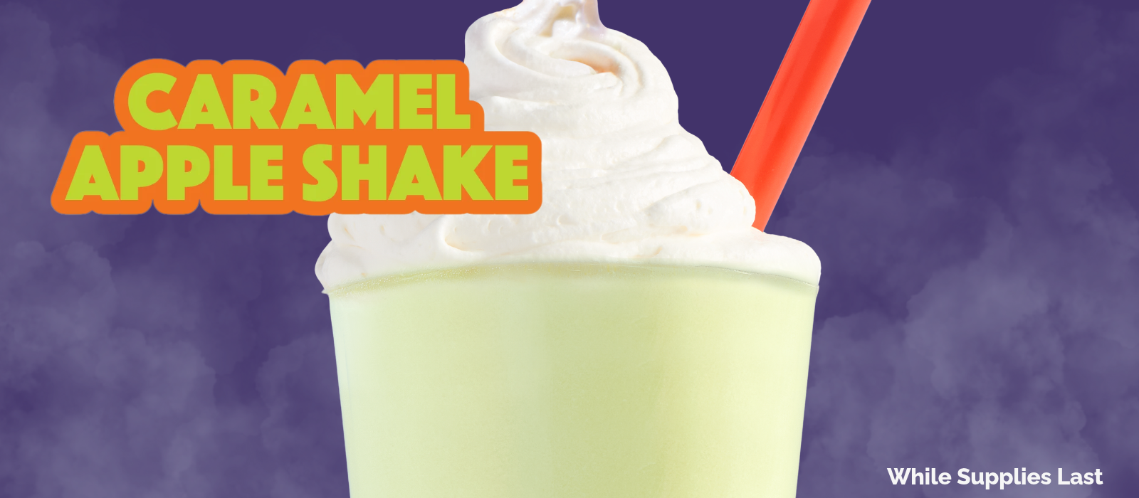 green shake with whipped cream and red straw